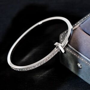 Tiffany & Co. Silver Crystal Pavé Cross Bangle - Sparkling Silver